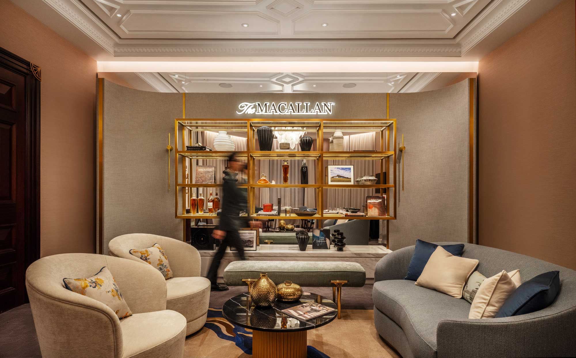 Harrods Residence Cha House Shanghai — The Macallan–branded lounge featuring gold display shelving, curated objets d’art, and sophisticated soft seating. Private Room.