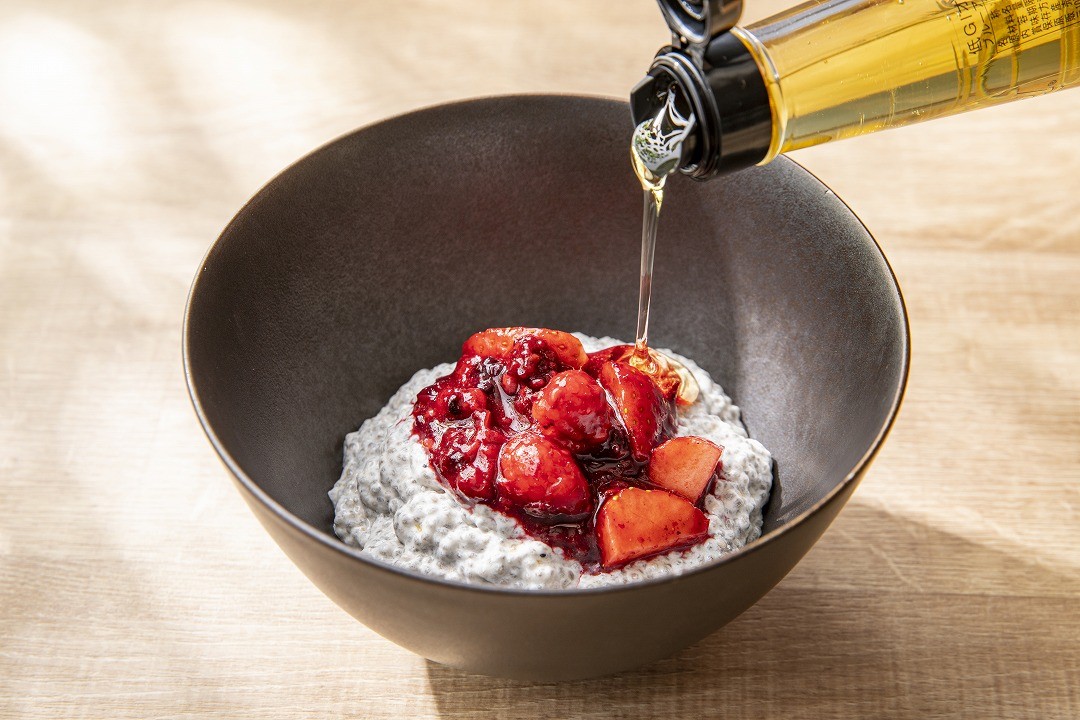 Dish served at District, Kimpton Shinjuku Tokyo, featuring a composed bowl with seasonal fruit and honey finish, reflecting the menu narrative developed through market research and concept creation.