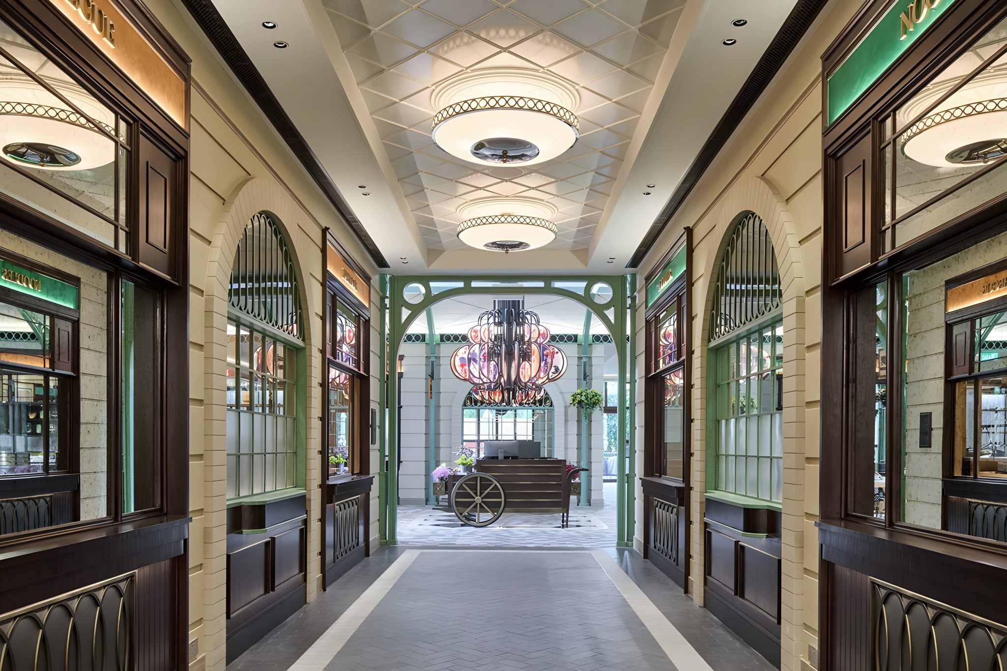 Entrance arcade at Chelsea Garden, Sands Resort Macao, designed by Social F+B, featuring a garden-inspired passage with arched openings, decorative lighting, and refined detailing that sets the tone for the dining experience.